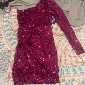 i am selling a brand new homecoming dress. never worn still has tags on it.